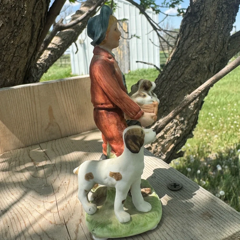 Norman Rockwell Puppy Love Figurine of Boy with Puppies